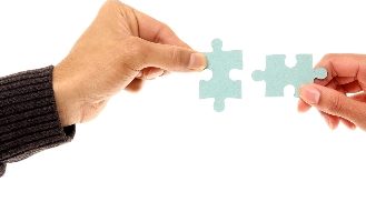 Two puzzle pieces brought together
